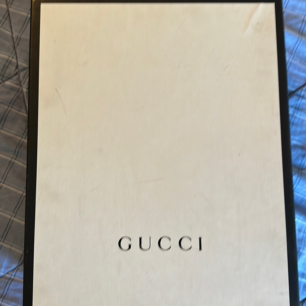 Black Gucci high top tiger sneakers